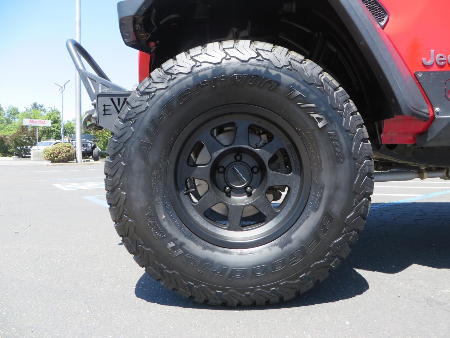 2019 Red /Black Jeep Wrangler Unlimited Rubicon (1C4HJXFN7KW) with an 2.0L L4 DOHC 16V TURBO engine, automatic transmission, located at 2630 Grass Valley Highway, Auburn, CA, 95603, (530) 508-5100, 38.937893, -121.095482 - Rubicon JL ready for all of your offroad adventures. This Jeep is sitting on a Rubicon Express lift kit, RE 2.5 Extreme series shocks, 17" Method bead grip wheels, 37" BFG KO2 tires, EVO front bumper, Warn winch, Road Armor rock slliders, and a HD Jeep spare tire carrier. - Photo#8